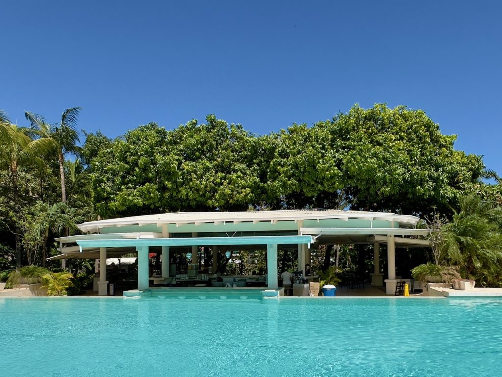 The resort pool is great for meeting people while traveling solo.